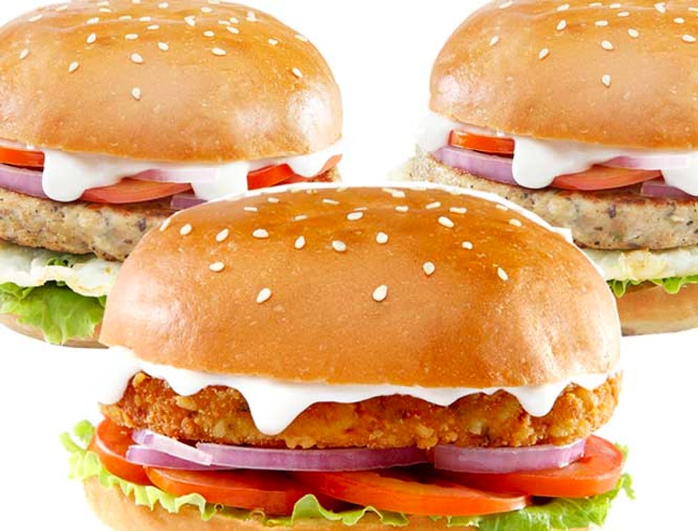 Three RushHrs chicken burgers with mayo